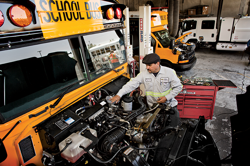propane-fleet-mechanic-working-on-propane-bus