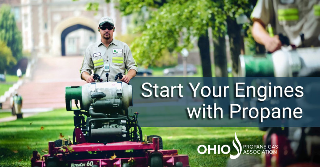 man-on-propane-lawnmower