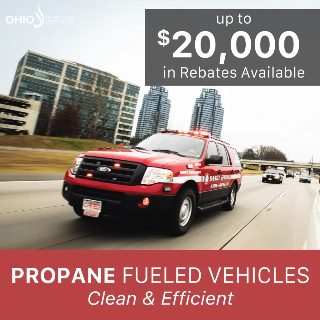 Red Sandy Springs fire-rescue SUV on the highway promoting propane-fueled vehicles and rebates up to $20,000