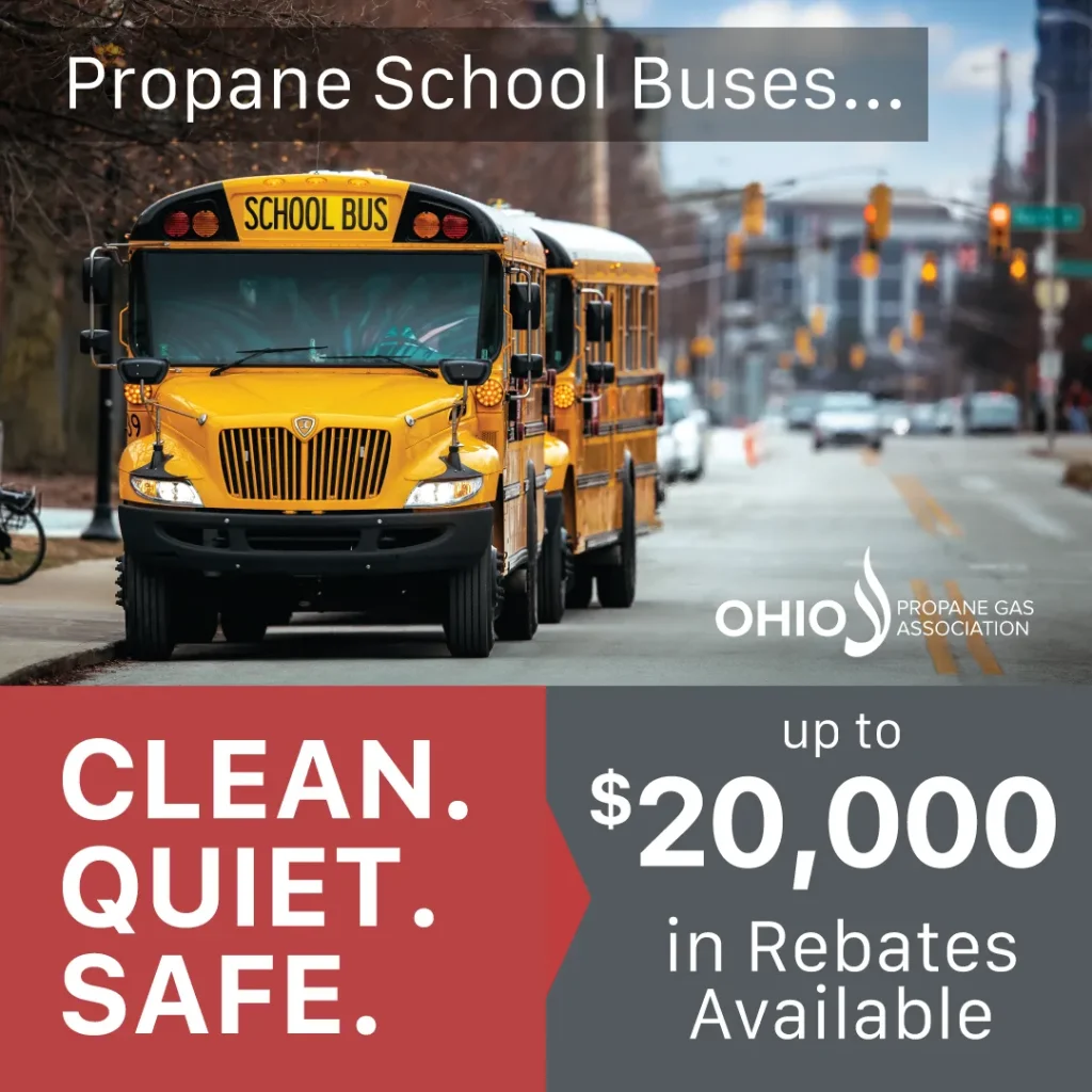 Yellow school buses on a city street with text promoting propane school bus rebates up to $20,000